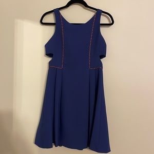 BCBGeneration Navy Blue dress with side cutouts and colored piping